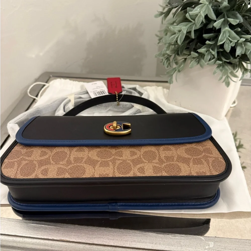 Coach X Champion Turnlock Clutch In Signature Canvas